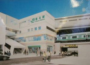 JR駅構内に貼られている駅舎の完成予想図、4階建てとなり、テナントも入居する予定