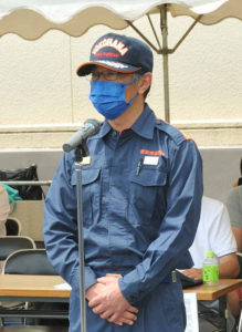 吉田崇港北消防署長が訓練の労を労（ねぎら）いこれまで以上に訓練に力を入れてもらえたらと語っていた