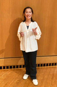 正指揮者の西井智美さん（はなみずきウインドオーケストラ提供）